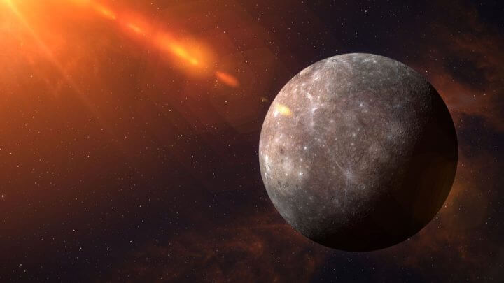 Imagem do planeta Mercúrio com uma luz amarela do lado