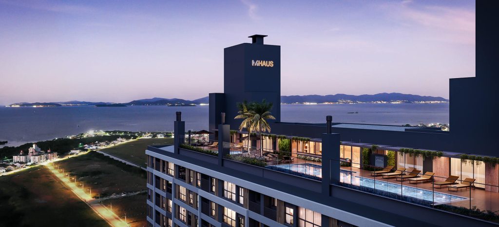 Tem um rooftop com vista panorâmica para a capital catarinense, montanhas e um imponente pôr do sol