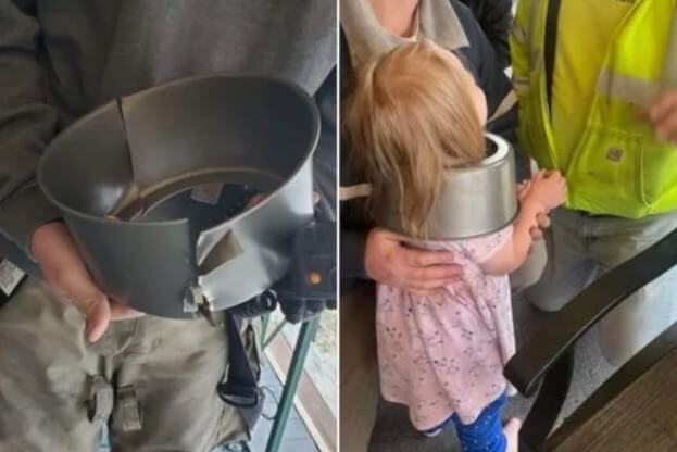 criança com cabeça presa