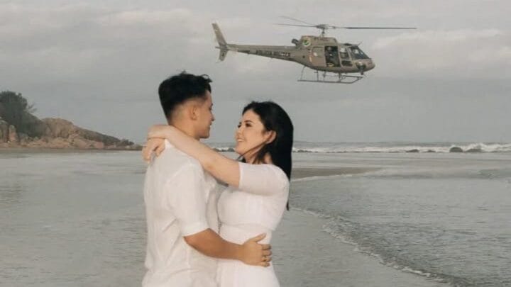 Helicóptero da PM invade ensaio de casamento em praia do Sul de SC: “Ele percebeu e resolveu participar”