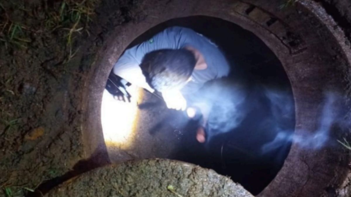 Suspeitos estavam dentro de bueiro em Canoinhas (Foto: Polícia Militar, Divulgação)