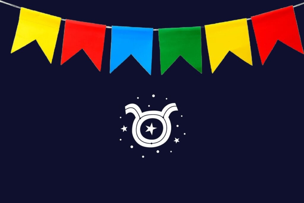 Ilustração do signo de Touro com um cÃrculo branco encimado por dois chifres curvos, sobre fundo escuro com bandeiras vermelhas, azuis, verdes e amarelas