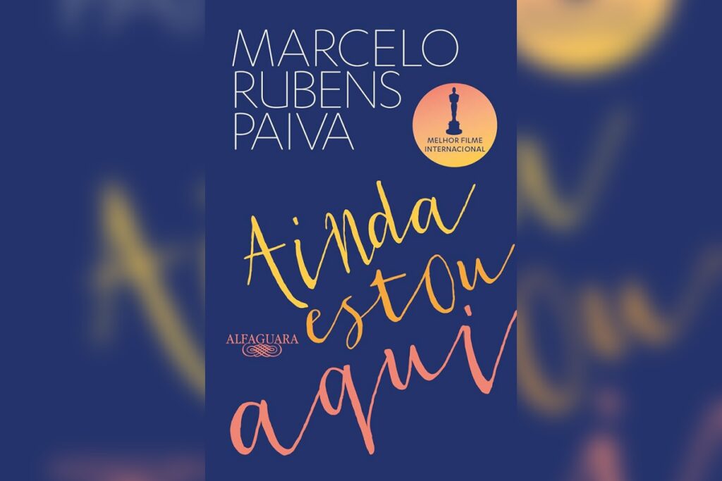 Capa azul do livro "Ainda Estou Aqui" com nome do autor e t&iacute;tulo em letras cursivas