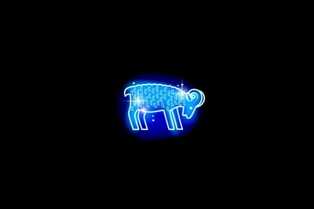Ilustração do signo de áries em azul sobre um fundo preto