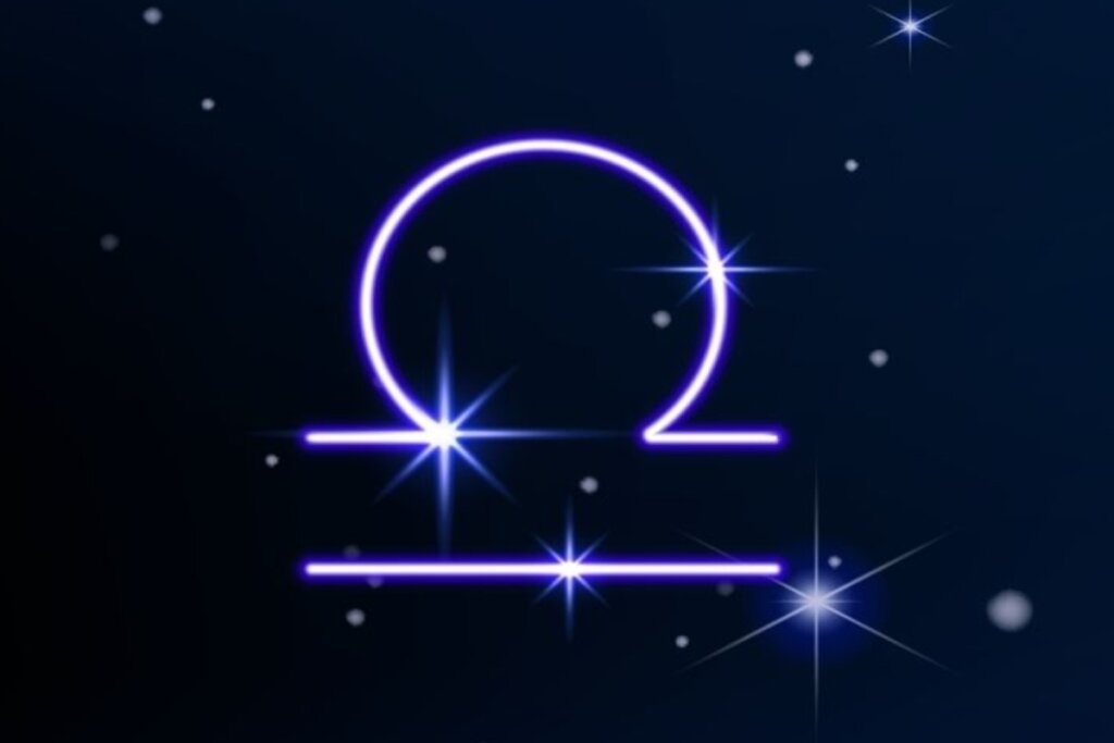 SÃ­mbolo do signo de Libra em roxo em fundo azul-escuro com pontos de luz simbolizando as estrelas