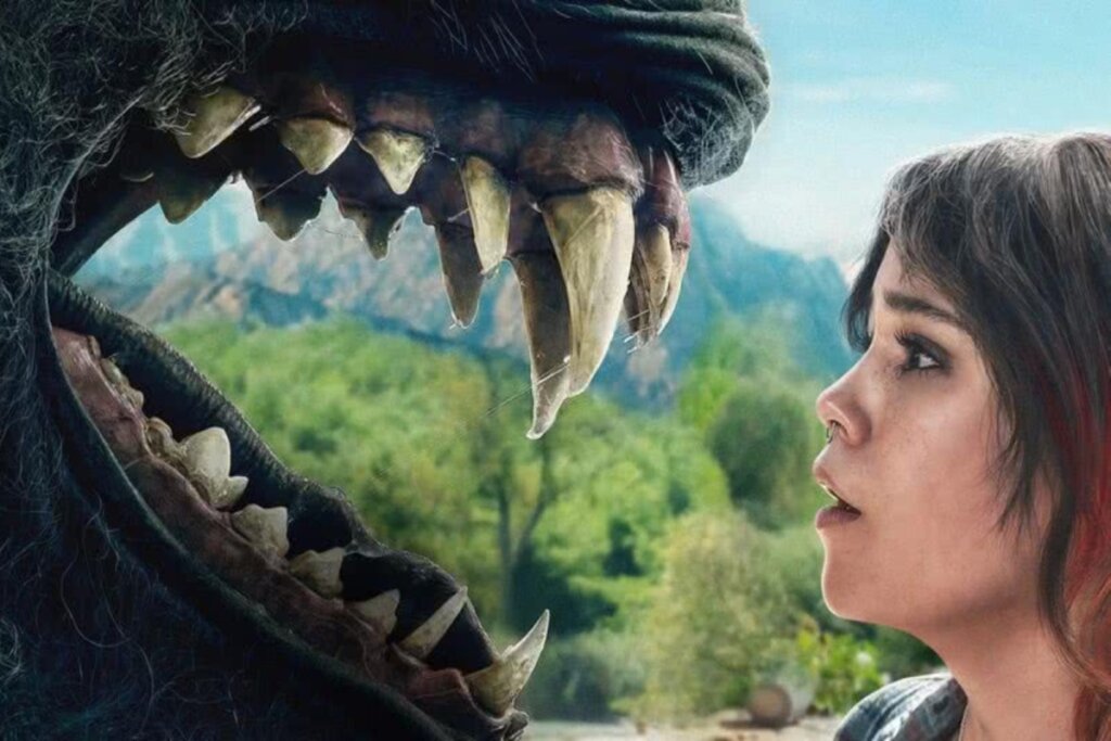 Imagem promocional de "A Morte de Um Unicórnio" mostrando uma jovem encarando a boca aberta de uma criatura gigante