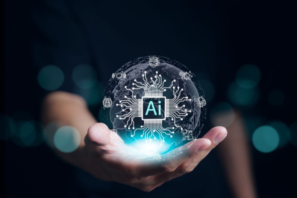 Homem com a mÃ£o estendida e em cima da mÃ£o um holograma simbolizando a InteligÃªncia Artificial