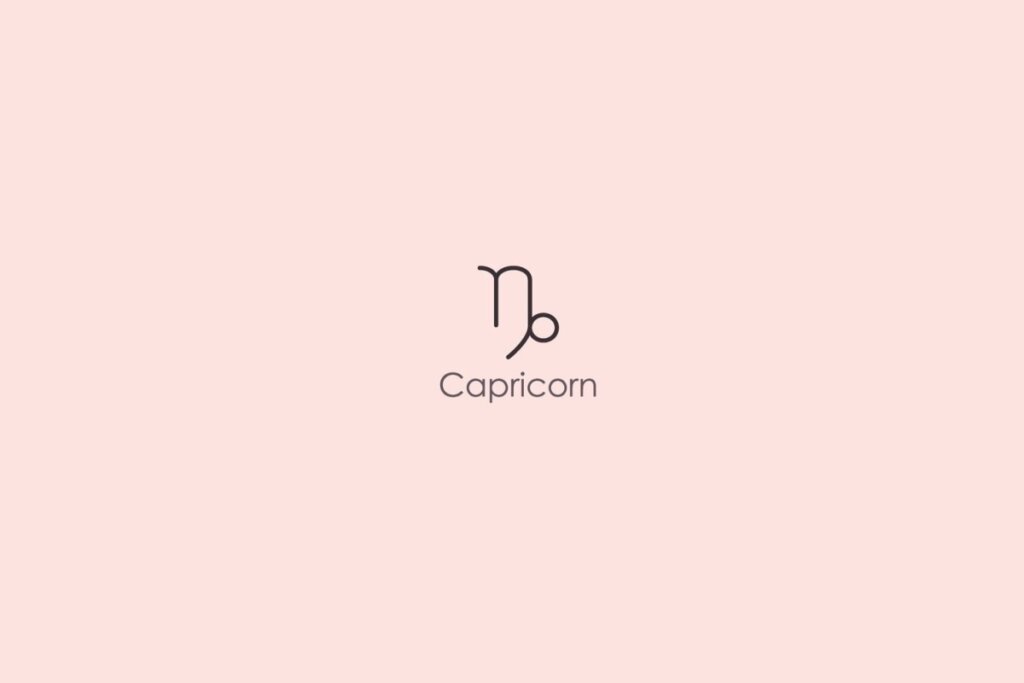 Ilustra&ccedil;&atilde;o do s&iacute;mbolo e nome do signo de capric&oacute;rnio em ingl&ecirc;s em fundo rosa