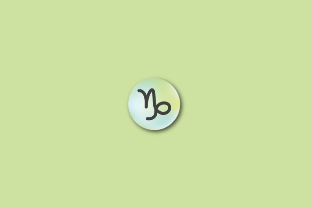 IlustraÃ§Ã£o do signo de capricÃ³rnio, em um cÃ­rculo com as cores verde, azul e amarelo, sobre um fundo verde