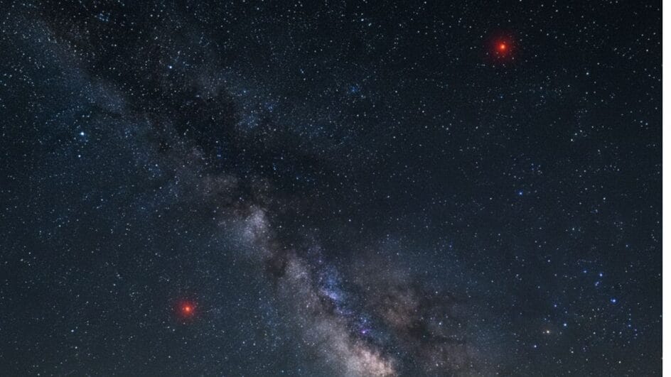 Estrelas vermelhas se destacam no céu (Foto: imagem gerada por IA)