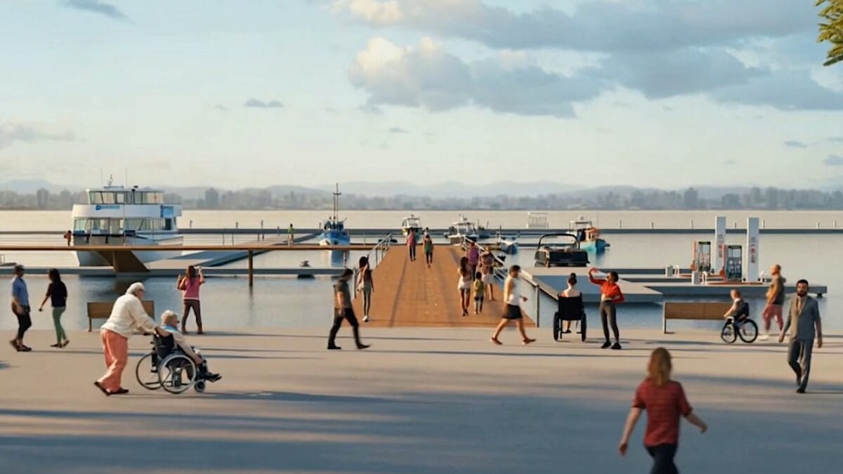 Projeto de p&iacute;er p&uacute;blico com circula&ccedil;&atilde;o de pessoas, embarca&ccedil;&otilde;es atracadas e estrutura acess&iacute;vel para diferentes usu&aacute;rios.