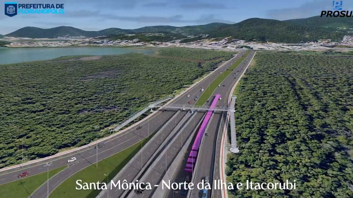 Simula&ccedil;&atilde;o a&eacute;rea do tr&acirc;nsito no sentido Santa M&ocirc;nica&ndash;Norte da Ilha&ndash;Itacorubi, com destaque para faixa elevada exclusiva para ve&iacute;culos que seguem em dire&ccedil;&atilde;o ao bairro Itacorubi, cercada por &aacute;rea verde.