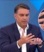 Flávio Bolsonaro usa “cola” na mão para sabatina no JN, na Globo; veja o que estava escrito
