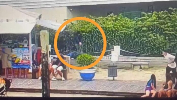 Câmera registrou homem levando tiro na cabeça à luz do dia na Praia Central de Balneário Camboriú