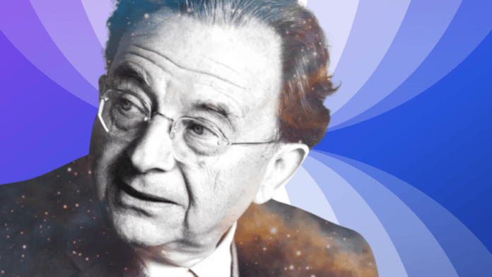 Retrato em preto e branco do psicanalista alemão Erich Fromm, de terno e óculos