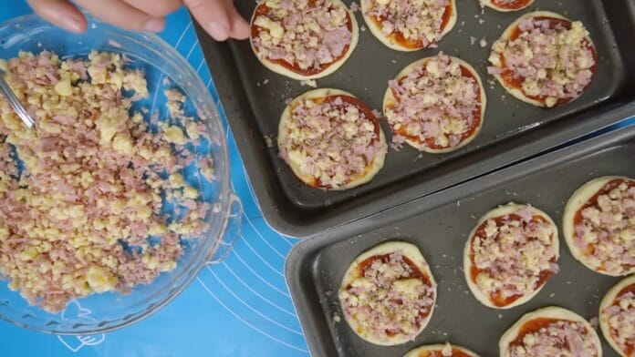 pizzas indo pro forno