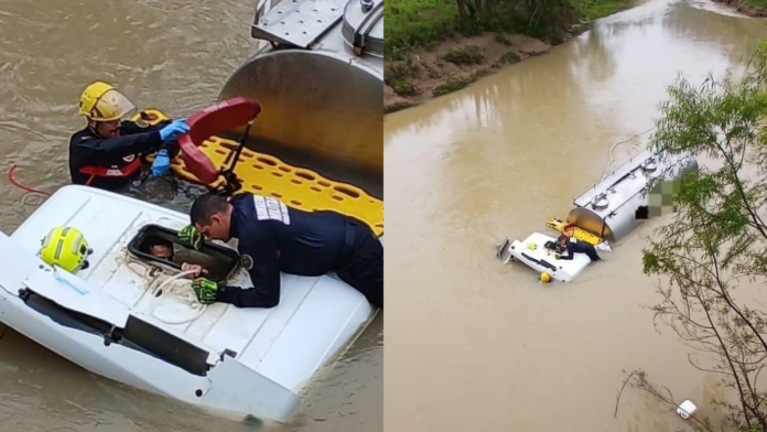 Caminhão ficou praticamente todo submerso após acidente em Ituporanga (Foto: CBMSC, Divulgação)